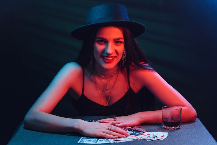 Live Dragon Tiger dealer placing cards on table with camera view